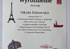 Dyplom dla uczennicy za udział w konkursie jęykowym.